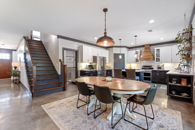 3181 Old Lebanon Dirt Rd, Mount Juliet, TN 37122 - dining area with ornamental molding, finished concrete floors, stairs, and recessed lighting