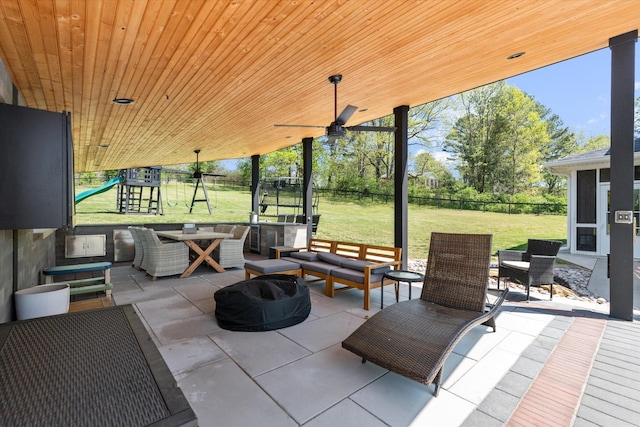 3181 Old Lebanon Dirt Rd, Mount Juliet, TN 37122 - view of patio / terrace with a ceiling fan, a playground, a fenced backyard, an outdoor living space, and a sunroom