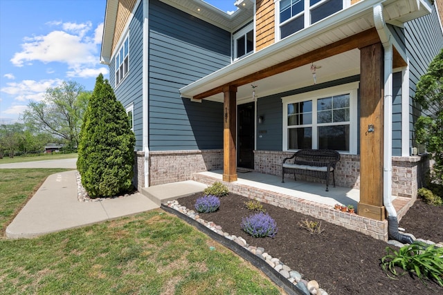 3181 Old Lebanon Dirt Rd, Mount Juliet, TN 37122 - view of exterior entry featuring brick siding and a porch