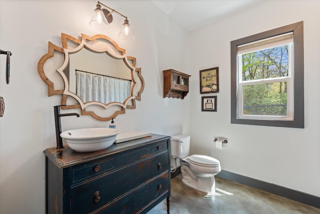 3181 Old Lebanon Dirt Rd, Mount Juliet, TN 37122 - bathroom with baseboards, vanity, concrete floors, and toilet