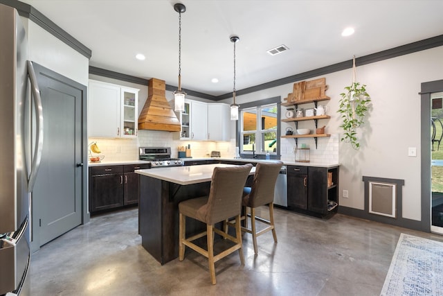 3181 Old Lebanon Dirt Rd, Mount Juliet, TN 37122 - kitchen featuring premium range hood, appliances with stainless steel finishes, finished concrete floors, and visible vents