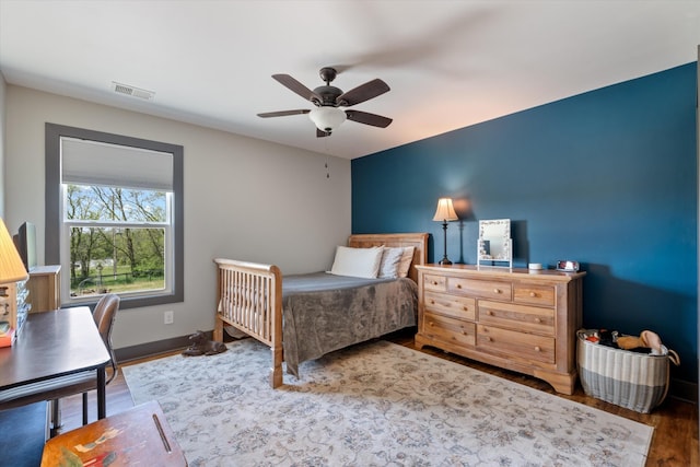 3181 Old Lebanon Dirt Rd, Mount Juliet, TN 37122 - bedroom featuring baseboards, wood finished floors, visible vents, and a ceiling fan