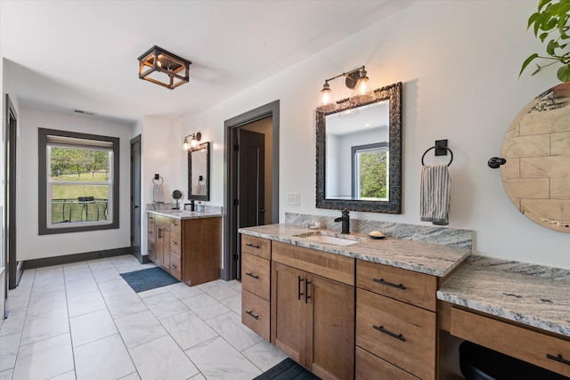 3181 Old Lebanon Dirt Rd, Mount Juliet, TN 37122 - full bath with marble finish floor, a wealth of natural light, two vanities, and a sink