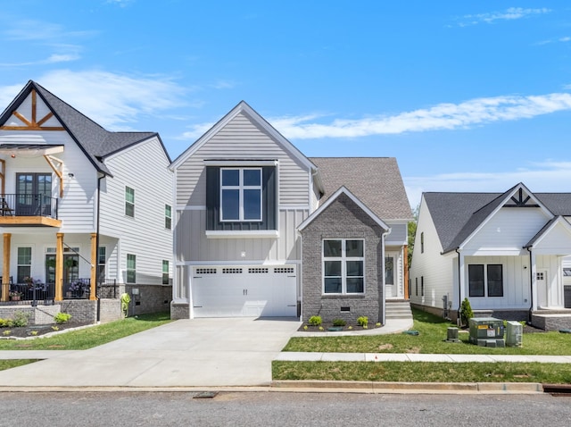 463 Centre St, Pleasant View, TN 37146 - view of front facade with board and batten siding, driveway, and a garage