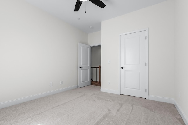 463 Centre St, Pleasant View, TN 37146 - unfurnished bedroom with ceiling fan, baseboards, and carpet flooring