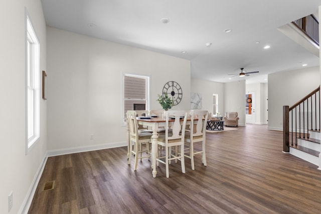 463 Centre St, Pleasant View, TN 37146 - dining space featuring baseboards, wood finished floors, a healthy amount of sunlight, and stairs