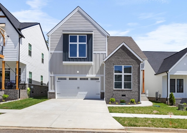 463 Centre St, Pleasant View, TN 37146 - view of front facade featuring board and batten siding, an attached garage, brick siding, and concrete driveway