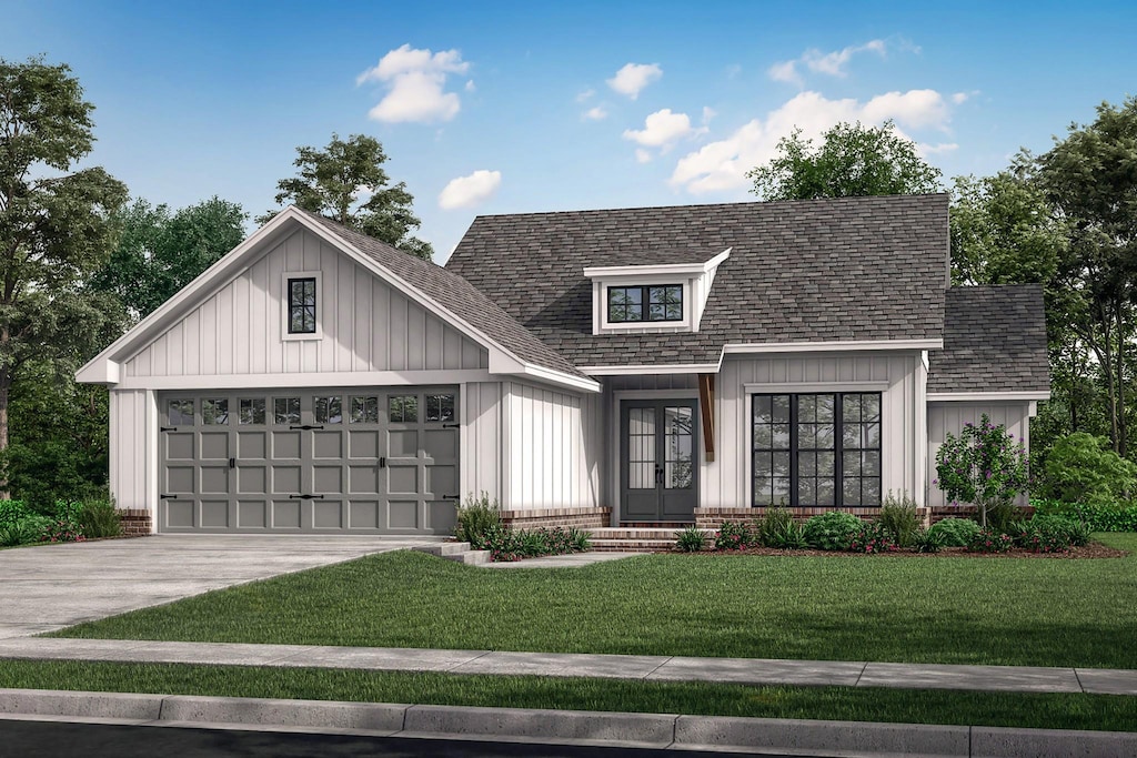 240 Dugout Rd, Summertown, TN 38483 - view of front of house featuring a shingled roof, a front lawn, an attached garage, board and batten siding, and driveway