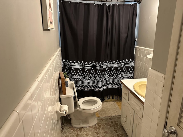 12748 Fruit Hill Red Bridge Rd, Crofton, KY 42217 - full bath with tile walls, wainscoting, toilet, and vanity