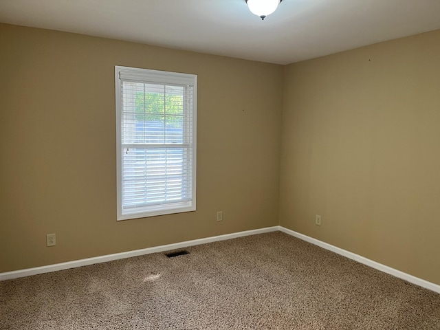1473 Chapmansboro Rd, Chapmansboro, TN 37035 - unfurnished room with carpet, visible vents, and baseboards