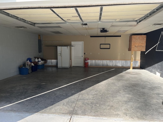 1473 Chapmansboro Rd, Chapmansboro, TN 37035 - garage featuring white refrigerator with ice dispenser