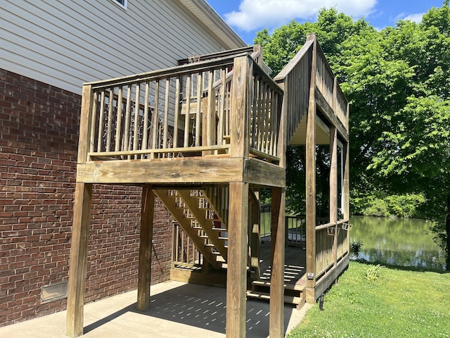 1473 Chapmansboro Rd, Chapmansboro, TN 37035 - wooden deck with a yard, stairs, and a water view