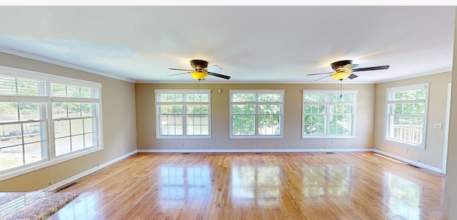 1473 Chapmansboro Rd, Chapmansboro, TN 37035 - unfurnished room featuring baseboards, ceiling fan, light wood-style floors, and crown molding