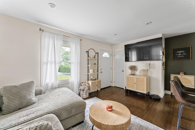bedroom with baseboards, hardwood / wood-style floors, and recessed lighting