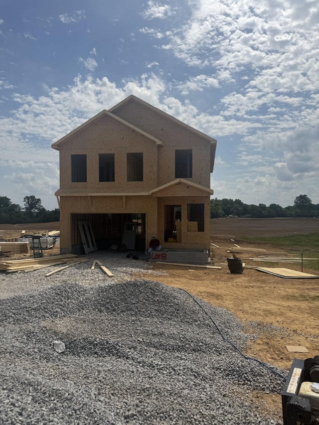 0 Hugh Hunter Rd, Oak Grove, KY 42262 - view of front facade featuring driveway, an attached garage, and stucco siding