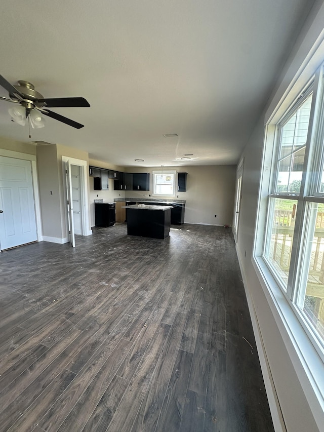 0 Hugh Hunter Rd, Oak Grove, KY 42262 - unfurnished living room with dark wood finished floors and a ceiling fan