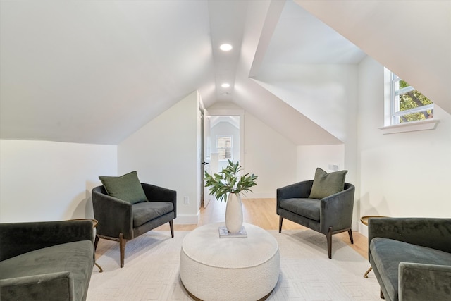 sitting room featuring recessed lighting, light wood finished floors, baseboards, and vaulted ceiling