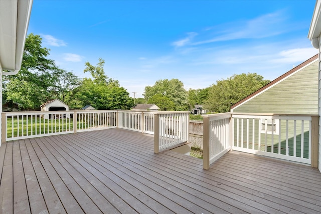wooden deck with an outdoor structure