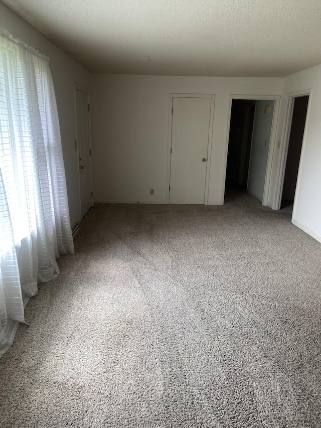 2169 Post Rd, Clarksville, TN 37043 - unfurnished room with light carpet and a textured ceiling
