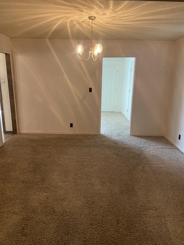 2169 Post Rd, Clarksville, TN 37043 - spare room with an inviting chandelier, baseboards, and carpet flooring