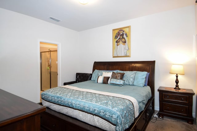 bedroom featuring baseboards, visible vents, and carpet floors