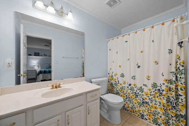 bathroom featuring tile patterned floors, toilet, visible vents, vanity, and ornamental molding