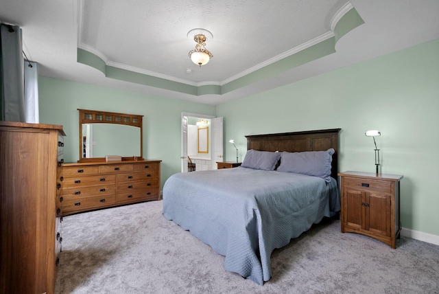 bedroom featuring light carpet, baseboards, and crown molding