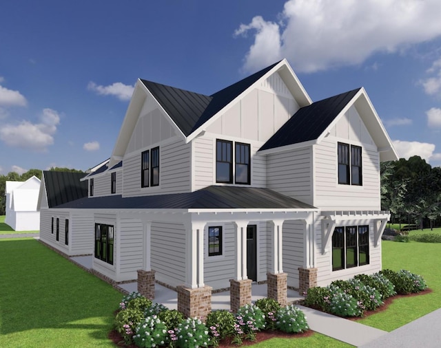 exterior space featuring a standing seam roof, board and batten siding, metal roof, a lawn, and a porch