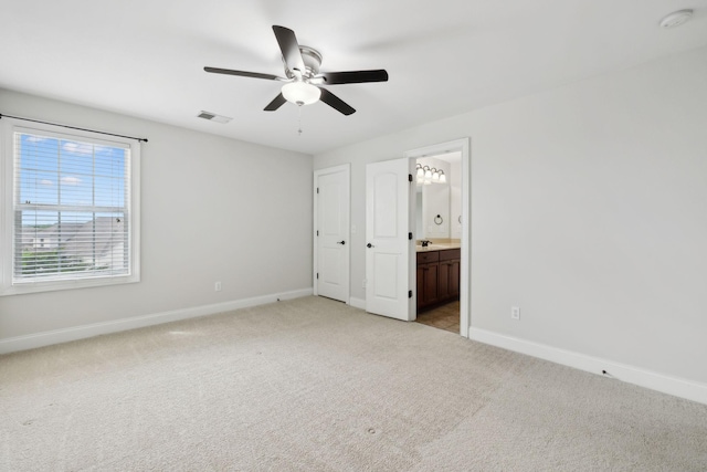 132 Thornwood Pl, Hendersonville, TN 37075 - unfurnished bedroom with ceiling fan, light carpet, baseboards, ensuite bath, and visible vents