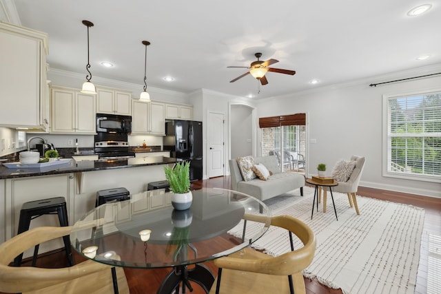 132 Thornwood Pl, Hendersonville, TN 37075 - dining space with wood finished floors, ornamental molding, and ceiling fan