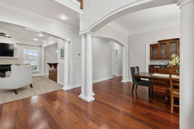 132 Thornwood Pl, Hendersonville, TN 37075 - interior space with wood-type flooring, arched walkways, crown molding, and decorative columns