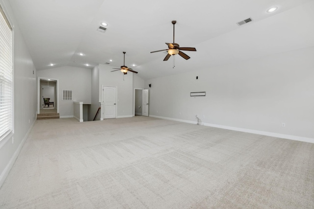 132 Thornwood Pl, Hendersonville, TN 37075 - unfurnished living room featuring light carpet, baseboards, visible vents, recessed lighting, and lofted ceiling