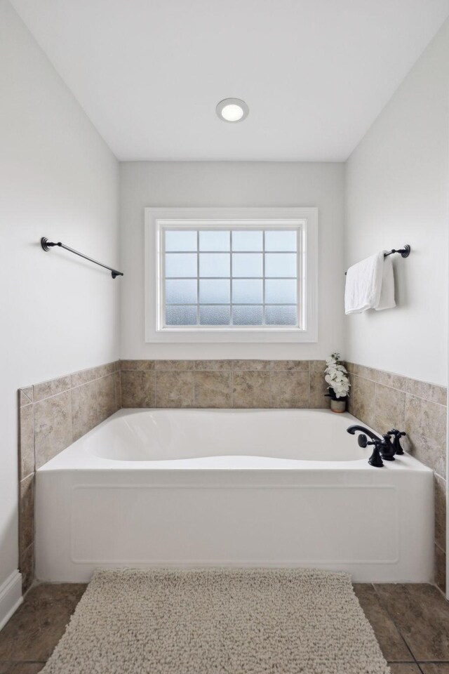 132 Thornwood Pl, Hendersonville, TN 37075 - bathroom featuring a bath, a healthy amount of sunlight, and tile patterned flooring