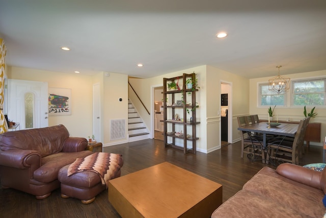 3201 Healy Dr, Nashville, TN 37207 - living room featuring visible vents, recessed lighting, an inviting chandelier, stairway, and dark wood-type flooring