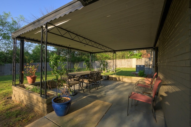 3201 Healy Dr, Nashville, TN 37207 - view of patio / terrace featuring outdoor dining area, central AC, and a fenced backyard