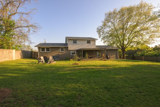 3201 Healy Dr, Nashville, TN 37207 - back of house with a fenced backyard and a yard