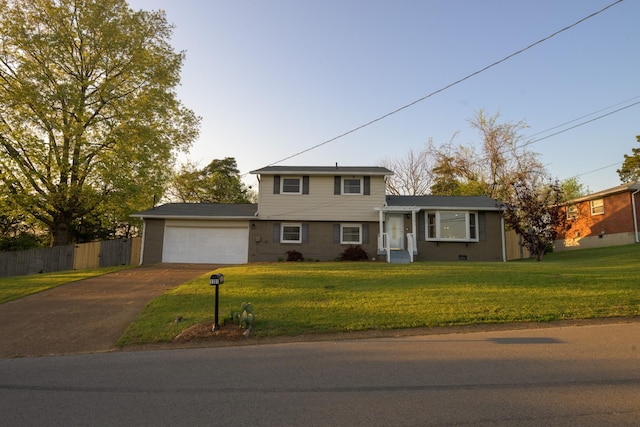 3201 Healy Dr, Nashville, TN 37207 - tri-level home with driveway, fence, a front yard, and a garage