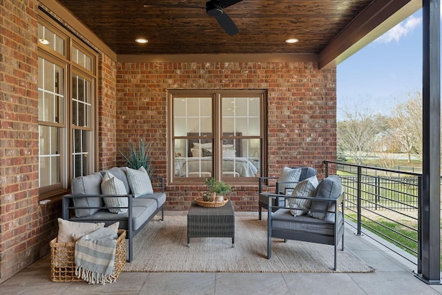 view of patio / terrace with an outdoor living space, a ceiling fan, and french doors