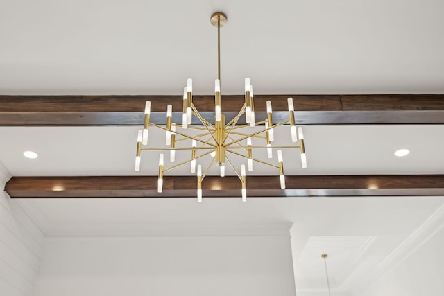 details featuring an inviting chandelier and recessed lighting