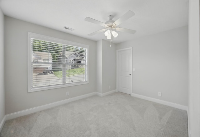1200 Eagles Bluff Dr, Clarksville, TN 37040 - unfurnished room featuring light colored carpet, baseboards, and a ceiling fan