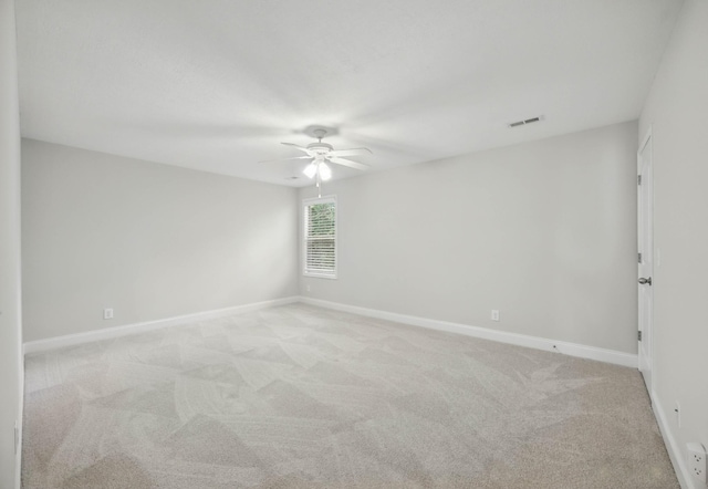 1200 Eagles Bluff Dr, Clarksville, TN 37040 - empty room featuring a ceiling fan, light colored carpet, and baseboards