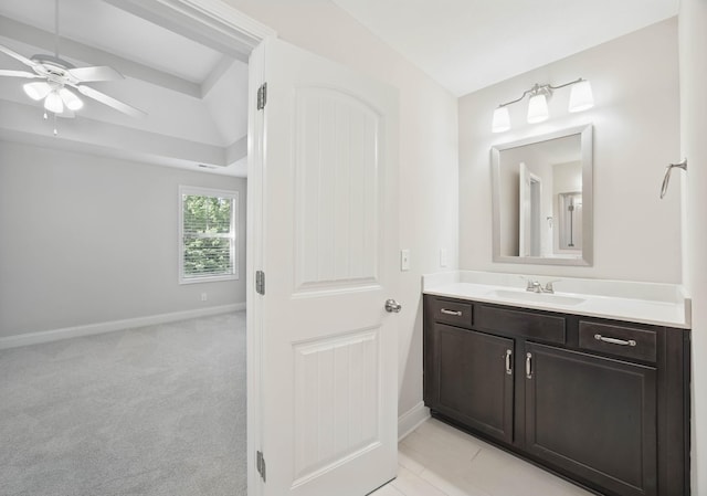 1200 Eagles Bluff Dr, Clarksville, TN 37040 - bathroom with vanity, a ceiling fan, baseboards, and a raised ceiling