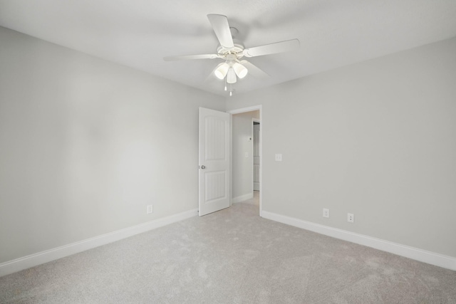 1200 Eagles Bluff Dr, Clarksville, TN 37040 - spare room with light colored carpet, a ceiling fan, and baseboards