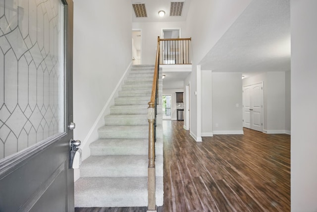 1200 Eagles Bluff Dr, Clarksville, TN 37040 - stairs with wood finished floors and baseboards