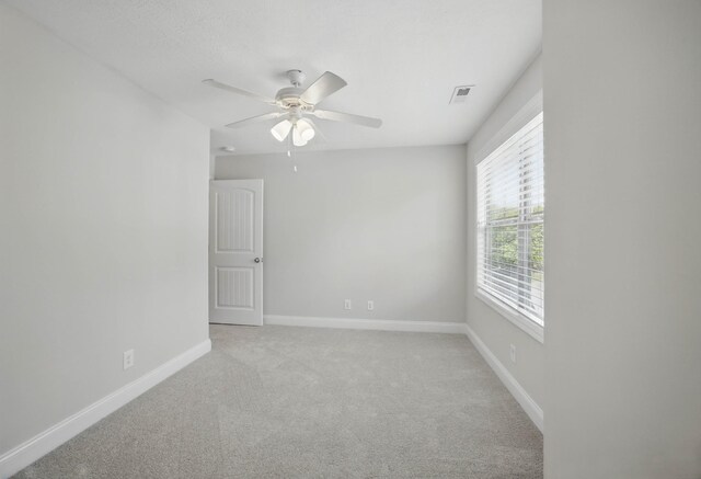 1200 Eagles Bluff Dr, Clarksville, TN 37040 - unfurnished room with light carpet, baseboards, and ceiling fan