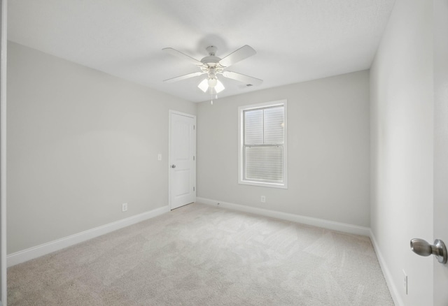 1200 Eagles Bluff Dr, Clarksville, TN 37040 - carpeted spare room featuring a ceiling fan and baseboards