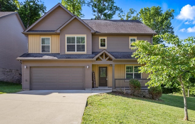 1200 Eagles Bluff Dr, Clarksville, TN 37040 - view of front of property with a garage, concrete driveway, a porch, a front lawn, and board and batten siding