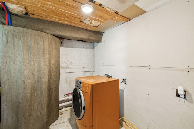 laundry room featuring laundry area and washer / clothes dryer