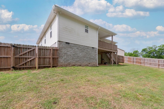 142 Sun Rise Rdg, Pulaski, TN 38478 - back of house with crawl space, a gate, stairway, a fenced backyard, and a yard