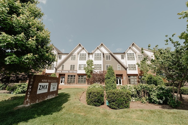 tudor house with a front lawn